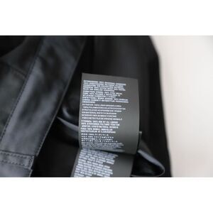 Prada Triangle Logo Trousers in Black Wool
